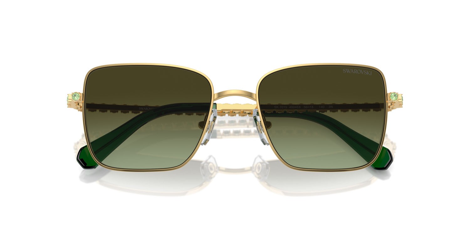 Sunglasses Swarovski SK 7015 (4004E8) color oro shape round lenses verde sfumato marrone