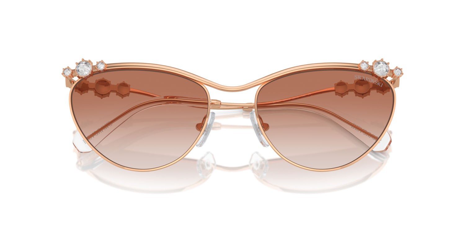 Sunglasses Swarovski SK 7017 (401413) color oro rose shape cat eye lenses rosa sfumato