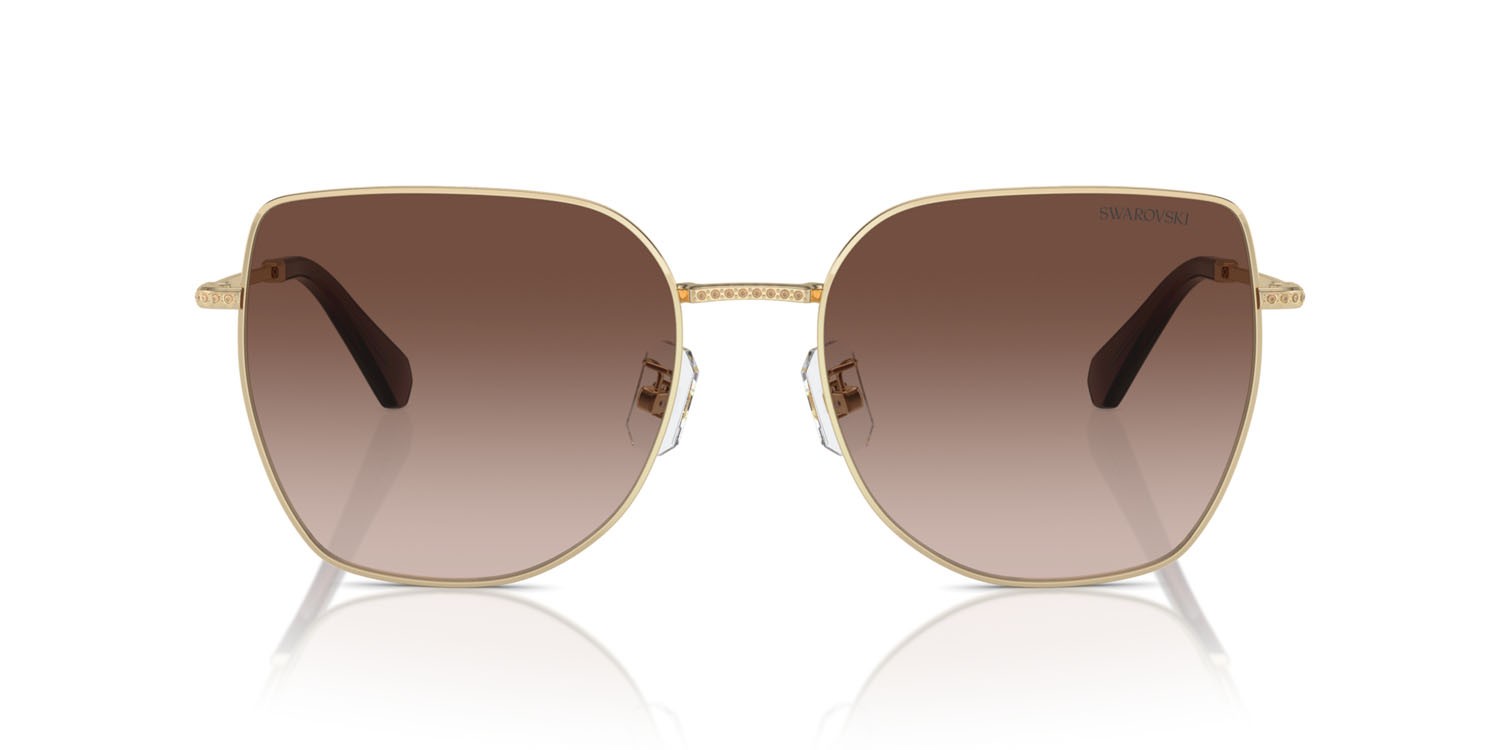 Occhiali da sole Swarovski SK 7021D (400213) colore oro pallido forma irregolare lenti marrone sfumato