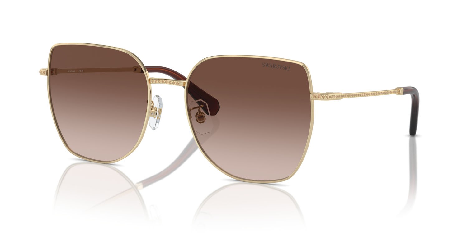 Occhiali da sole Swarovski SK 7021D (400213) colore oro pallido forma irregolare lenti marrone sfumato