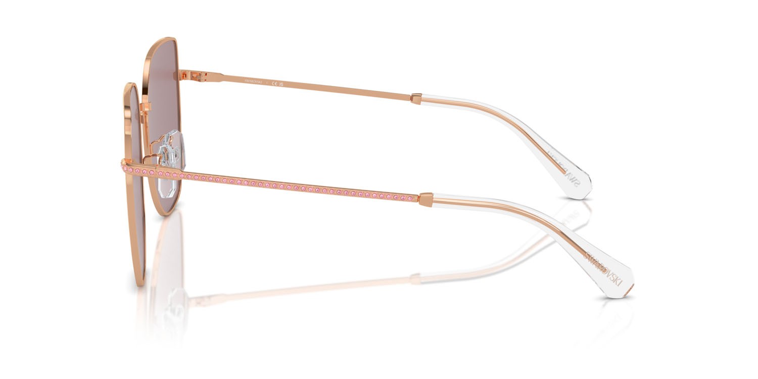 Occhiali da sole Swarovski SK 7021D (40147N) colore oro rose forma irregolare lenti viola chiaro/marrone