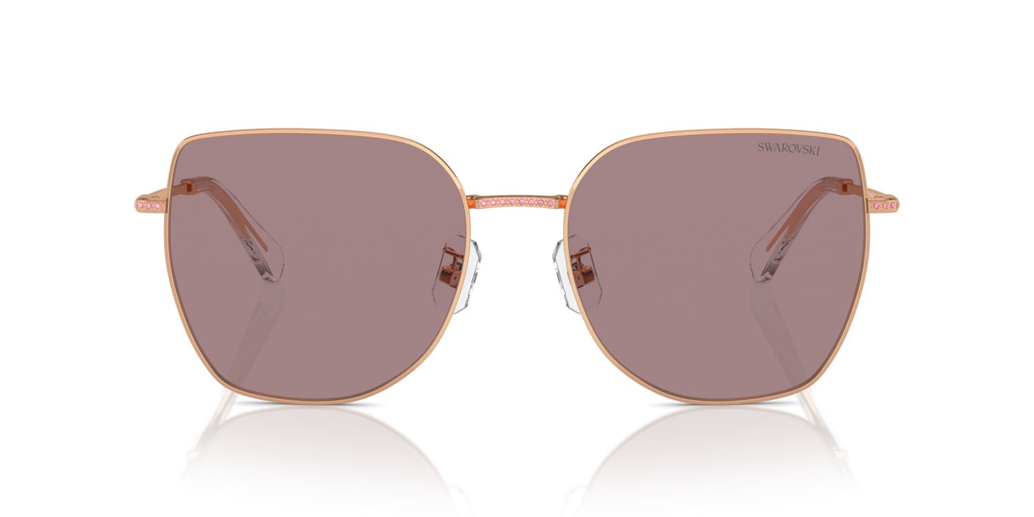 Occhiali da sole Swarovski SK 7021D (40147N) colore oro rose forma irregolare lenti viola chiaro/marrone