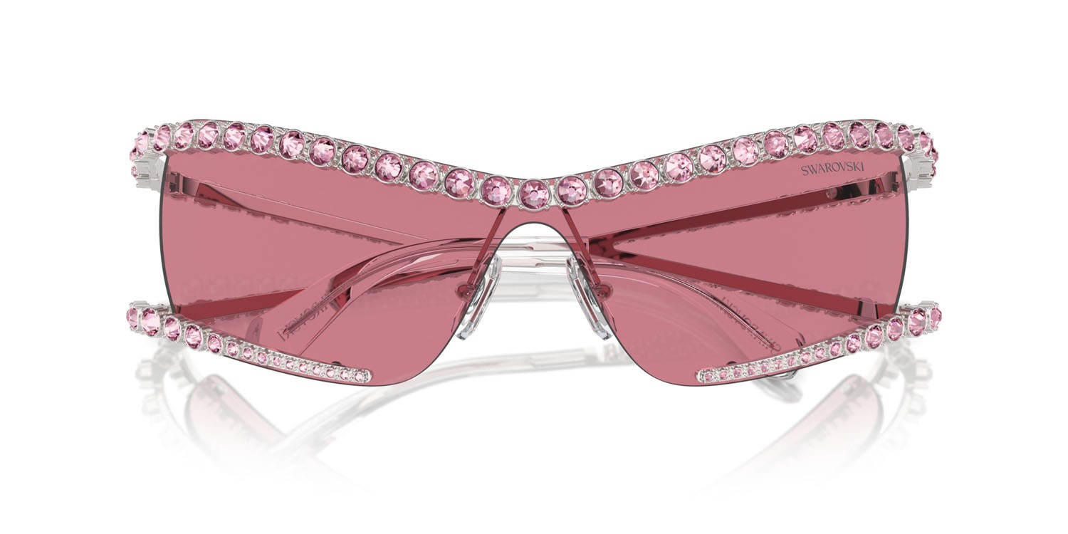 Sunglasses Swarovski SK 7022 (402384) color argento shape irregular lenses rosa