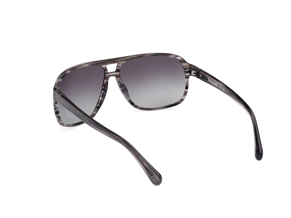 Occhiali da sole Timberland TB00031 (20D) colore grigio lucido forma navigator lenti fumo grad.