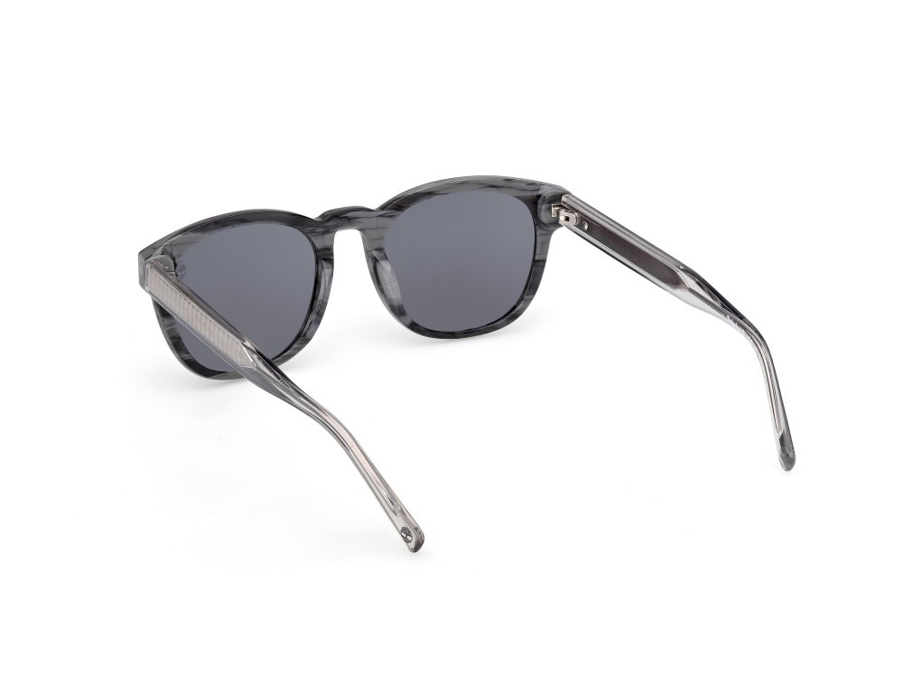 Sunglasses Timberland TB00060 (90D) color azzurro/corno - cristallo shape round lenses fumo polar.