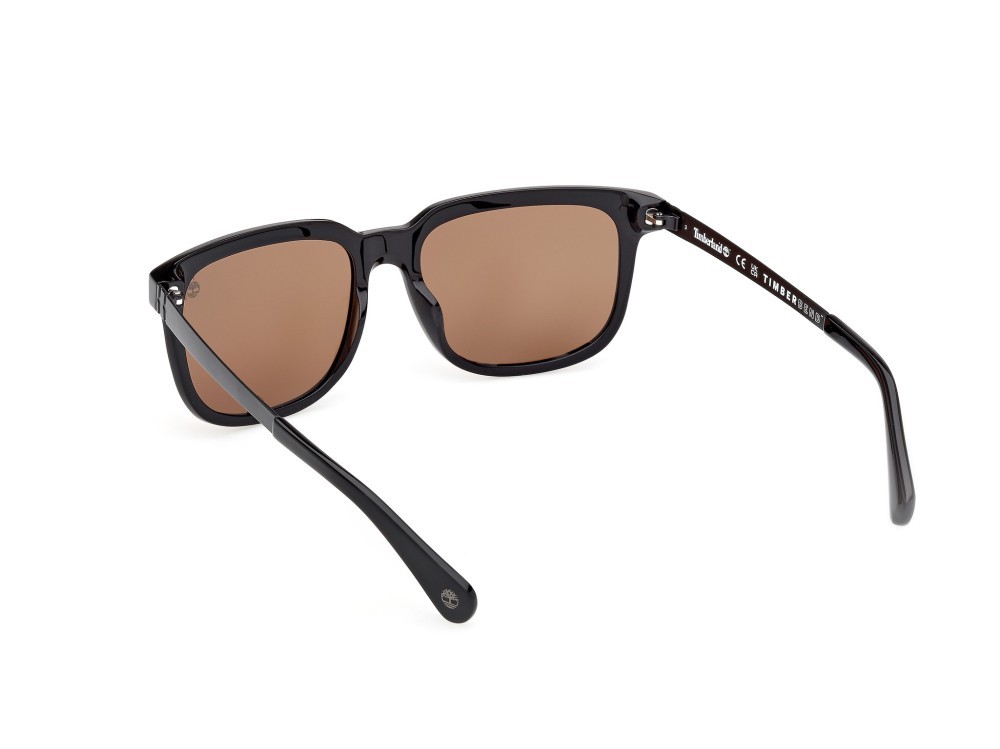 Sunglasses Timberland TB00064 (01H) color nero lucido - nero opaco shape rectangle lenses marrone polar.