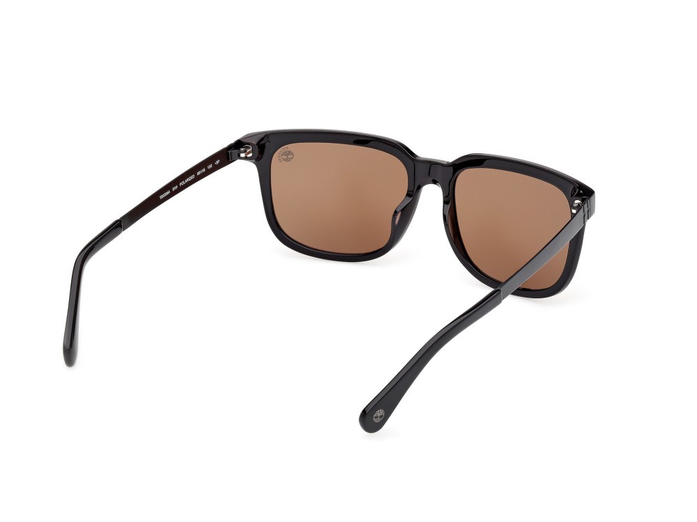 Sunglasses Timberland TB00064 (01H) color nero lucido - nero opaco shape rectangle lenses marrone polar.