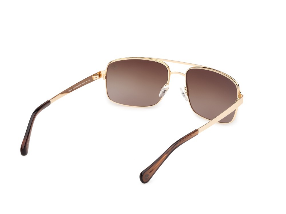 Sunglasses Timberland TB00065 (32H) color oro pallido lucido shape navigator lenses marrone polar.