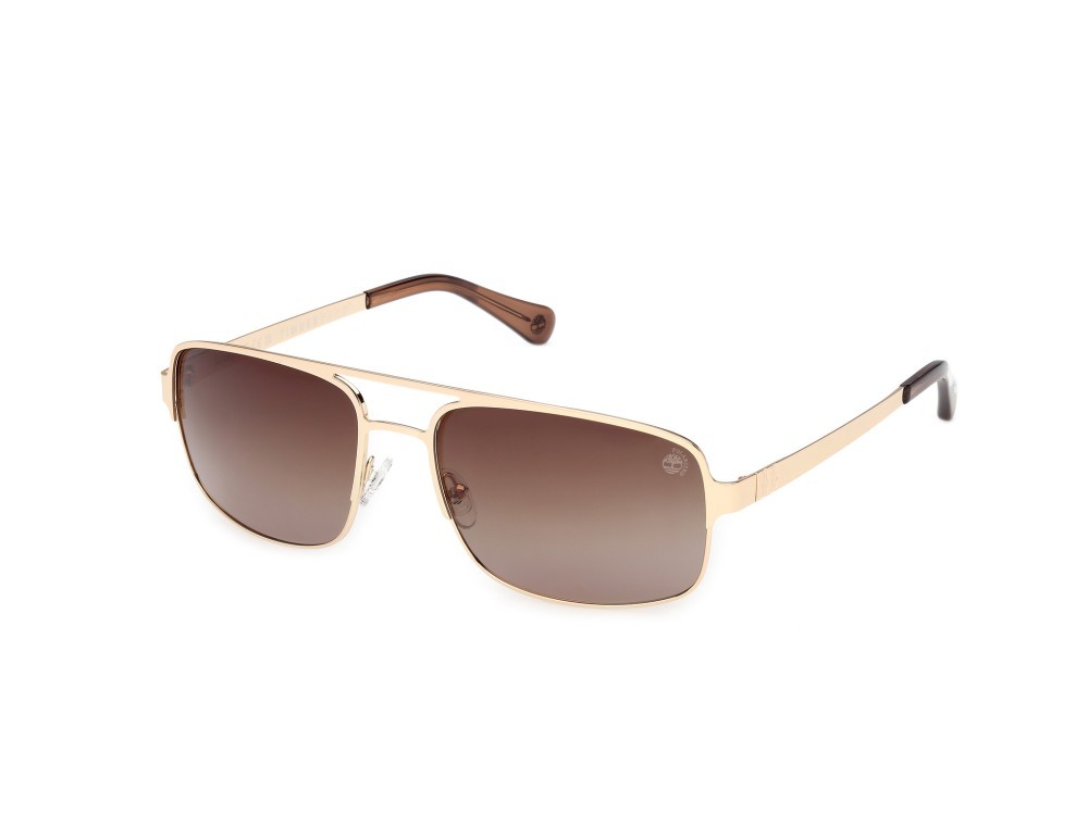 Sunglasses Timberland TB00065 (32H) color oro pallido lucido shape navigator lenses marrone polar.
