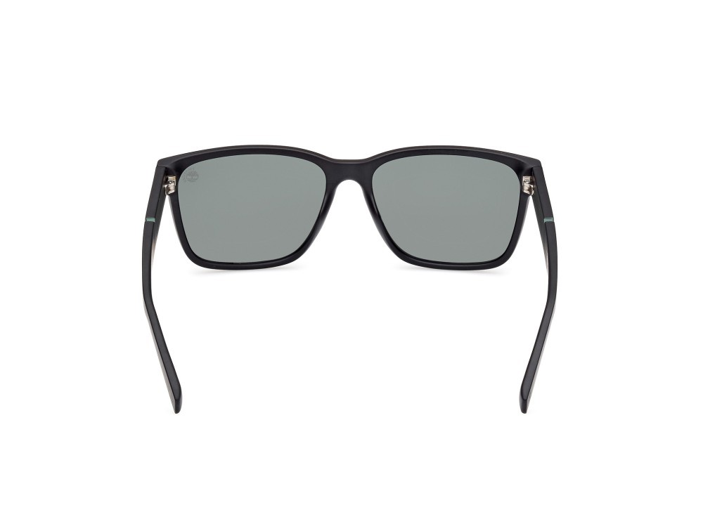 Occhiali da sole Timberland TB9335-H (02R) colore nero opaco forma rettangolare lenti verde polar.