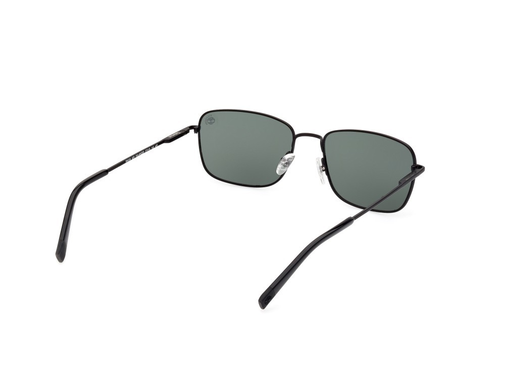 Occhiali da sole Timberland TB9338 (02R) colore nero opaco forma quadrato lenti verde polar.