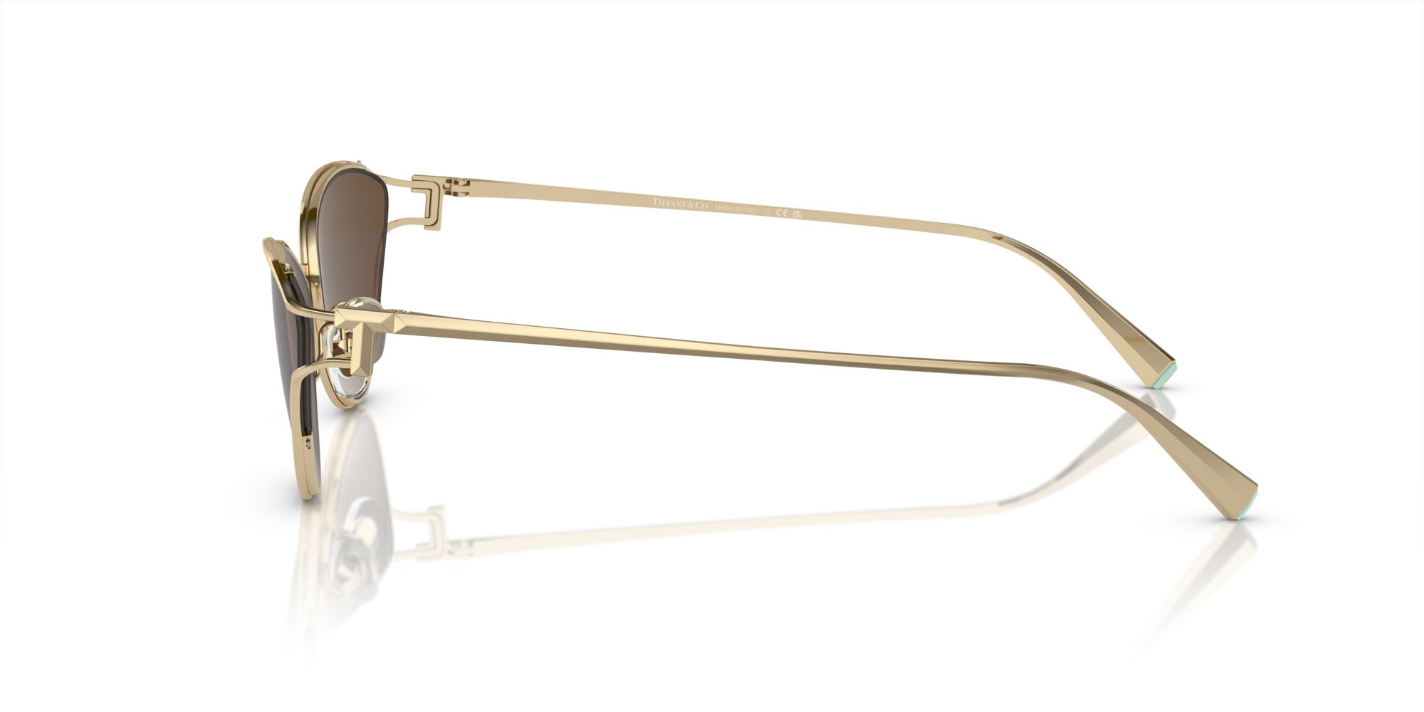 Occhiali da sole Tiffany TF 3095 (61933G) colore oro pallido forma cat eye lenti marrone chiaro