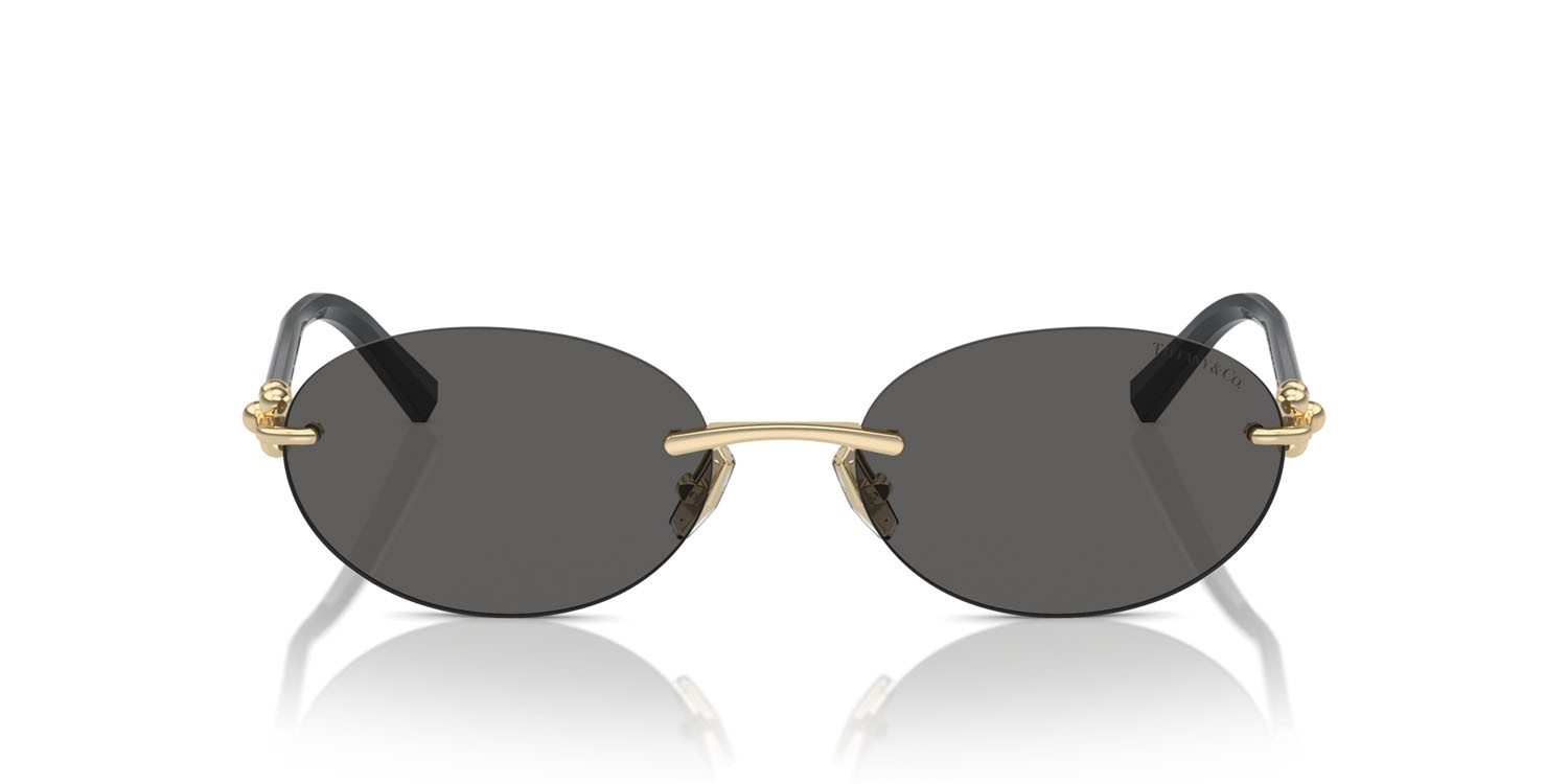 Occhiali da sole Tiffany TF 3104D (6216S4) colore oro pallido forma ovale lenti grigio scuro