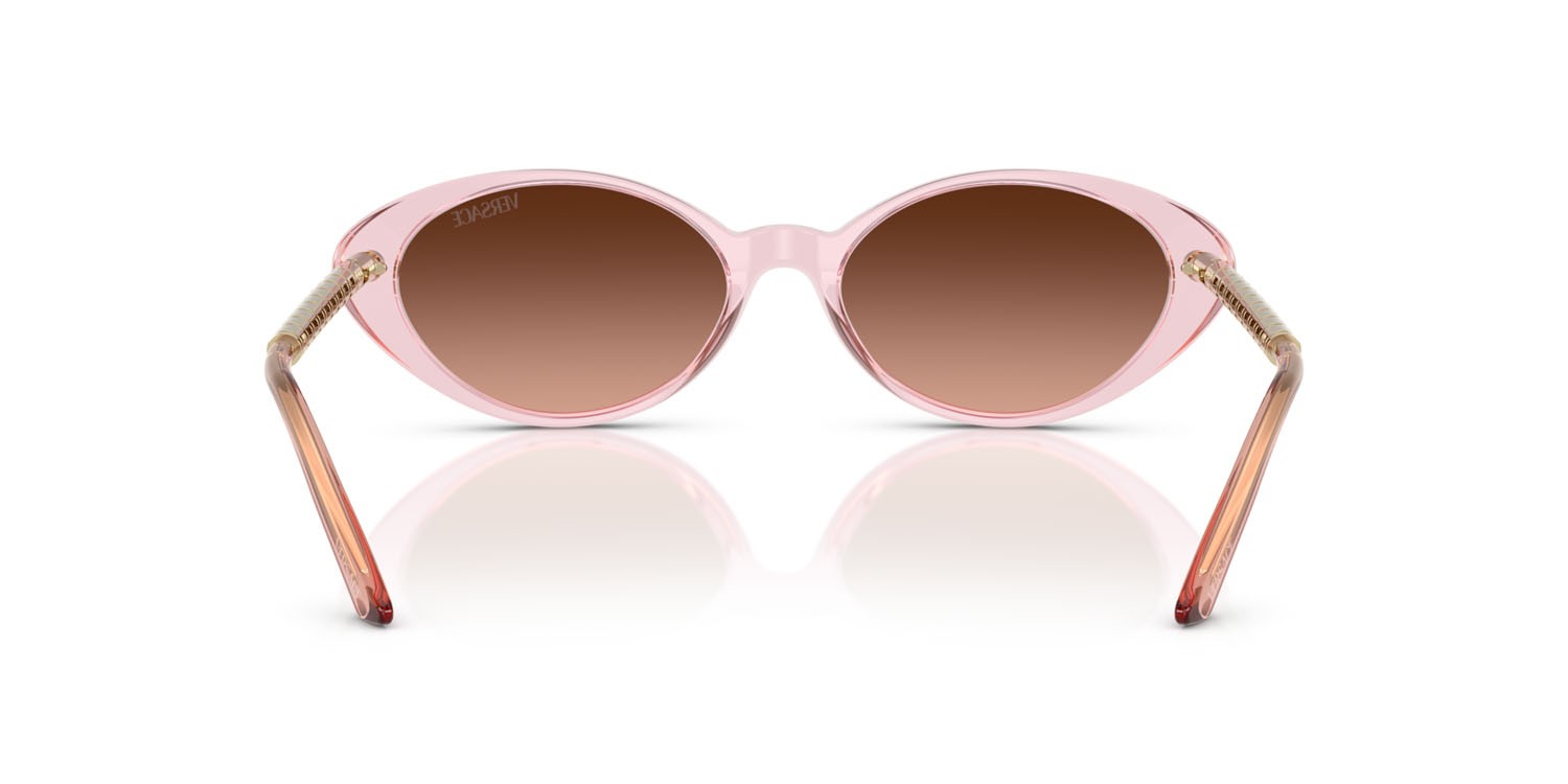 Occhiali da sole Versace VE 4469 (54725M) colore rosa trasparente forma ovale lenti rosa sfumato grigio