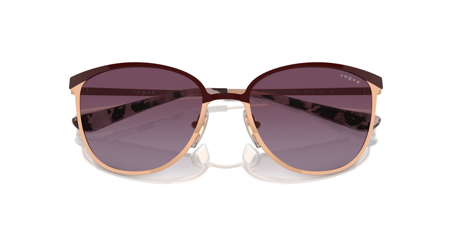 Occhiali da sole Vogue VO 4002S (51708H) colore top bordeaux/oro rose forma rettangolare lenti violetto sfumato