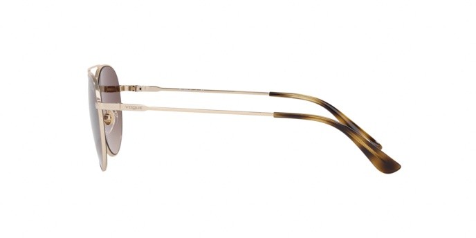Occhiali da sole Vogue VO 4129S (848/13) colore pale gold forma ovale lenti brown gradient