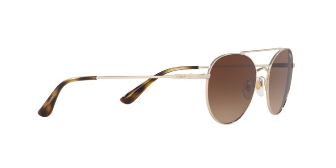 Occhiali da sole Vogue VO 4129S (848/13) colore pale gold forma ovale lenti brown gradient