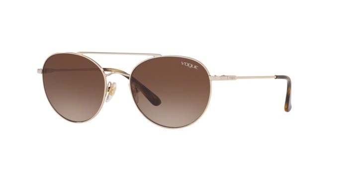 Occhiali da sole Vogue VO 4129S (848/13) colore pale gold forma ovale lenti brown gradient