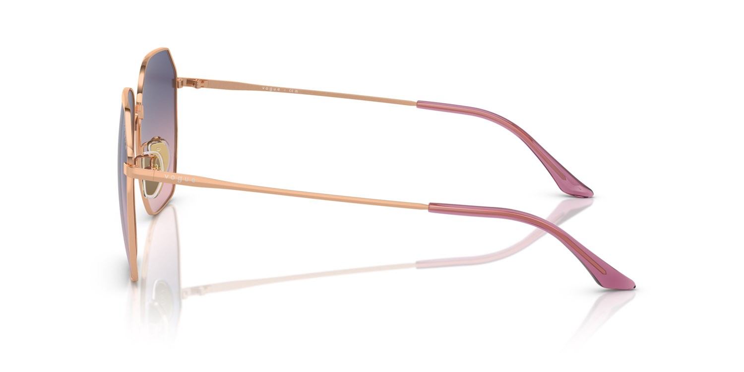 Occhiali da sole Vogue VO 4215SD (5152I6) colore oro rose forma irregolare lenti rosa/blu sfumato