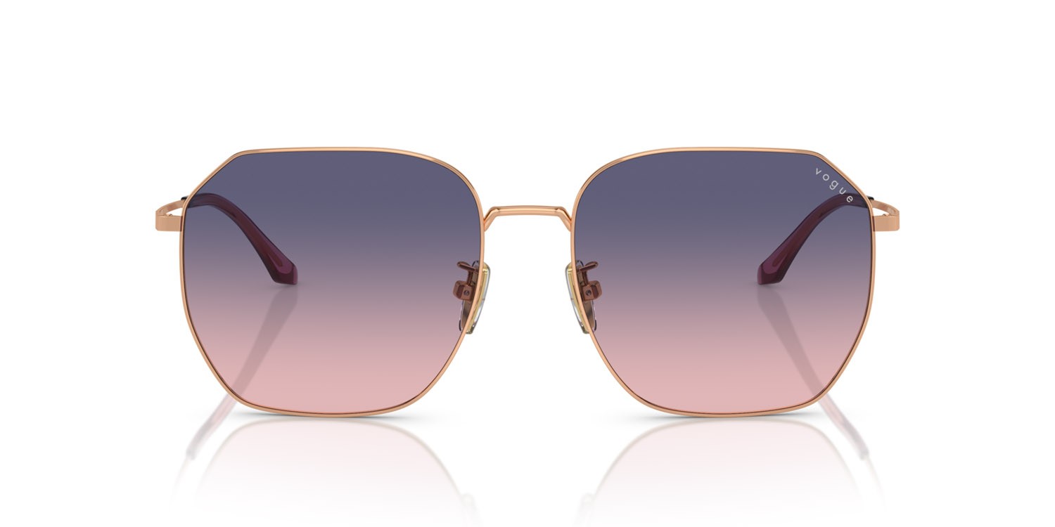 Occhiali da sole Vogue VO 4215SD (5152I6) colore oro rose forma irregolare lenti rosa/blu sfumato