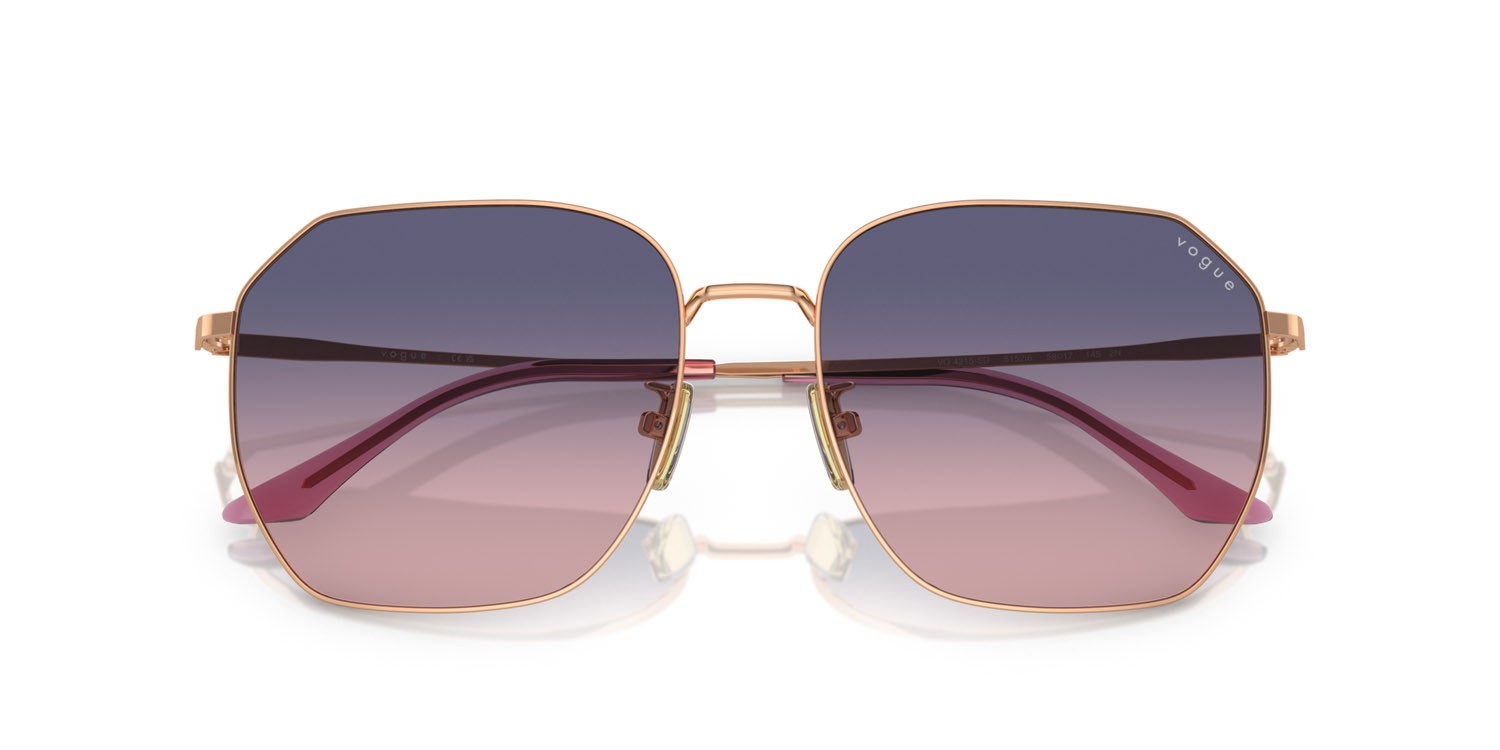 Occhiali da sole Vogue VO 4215SD (5152I6) colore oro rose forma irregolare lenti rosa/blu sfumato