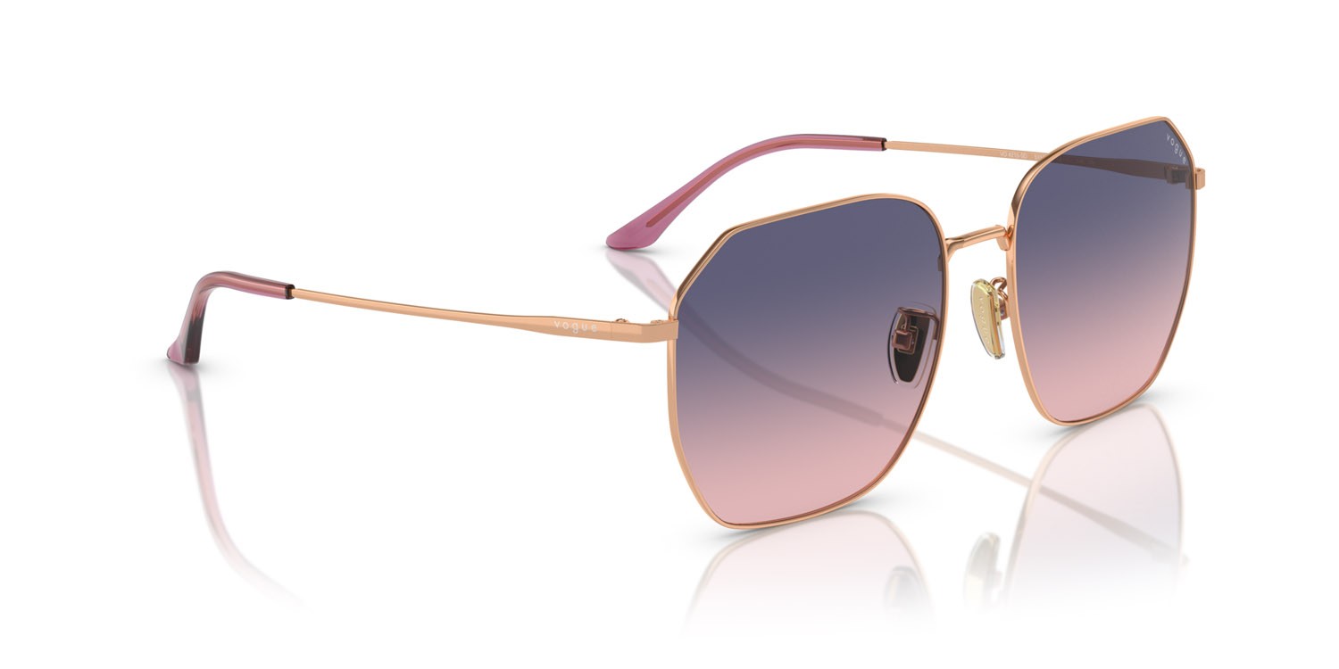 Occhiali da sole Vogue VO 4215SD (5152I6) colore oro rose forma irregolare lenti rosa/blu sfumato