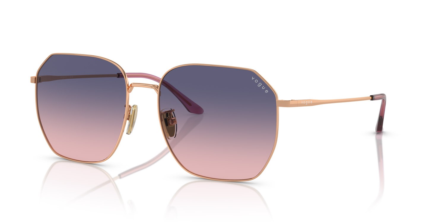 Occhiali da sole Vogue VO 4215SD (5152I6) colore oro rose forma irregolare lenti rosa/blu sfumato