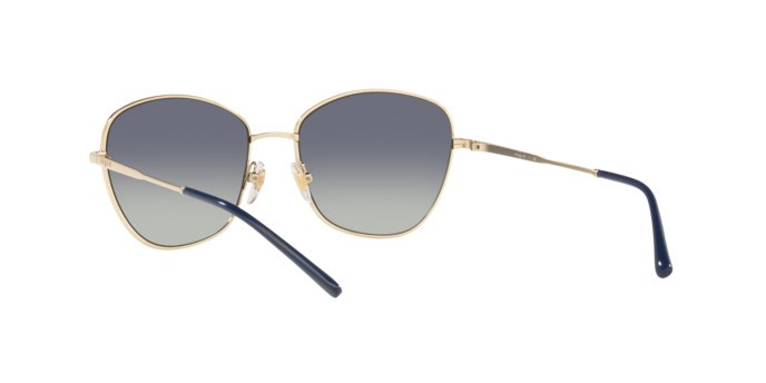 Occhiali da sole Vogue VO 4232S (848/4L) colore pale gold forma farfalla lenti grey gradient dark blue