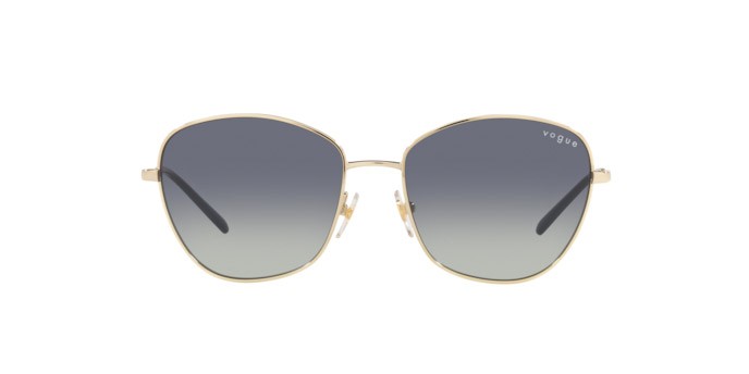 Occhiali da sole Vogue VO 4232S (848/4L) colore pale gold forma farfalla lenti grey gradient dark blue