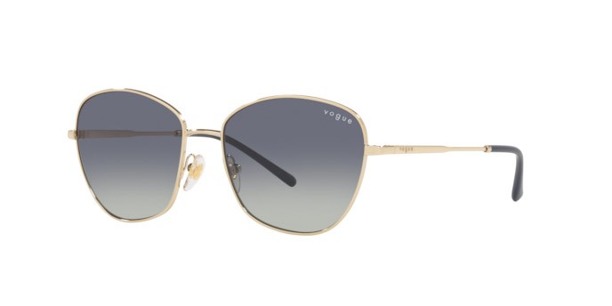 Occhiali da sole Vogue VO 4232S (848/4L) colore pale gold forma farfalla lenti grey gradient dark blue