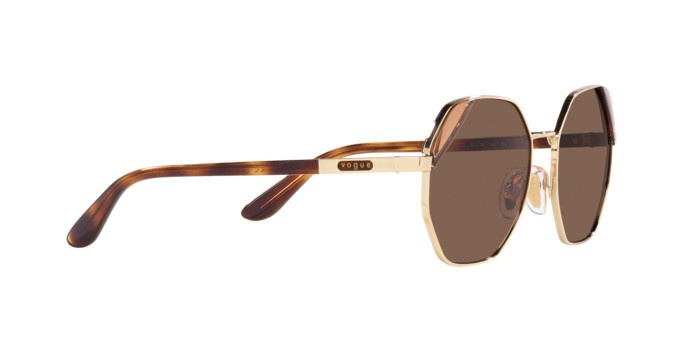 Occhiali da sole Vogue VO 4268S (848/73) colore oro pallido forma irregolare lenti marrone scuro