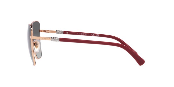 Occhiali da sole Vogue VO 4277SB (515211) colore oro rosa forma farfalla lenti grigio sfumato