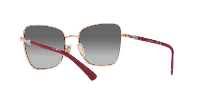 Occhiali da sole Vogue VO 4277SB (515211) colore oro rosa forma farfalla lenti grigio sfumato
