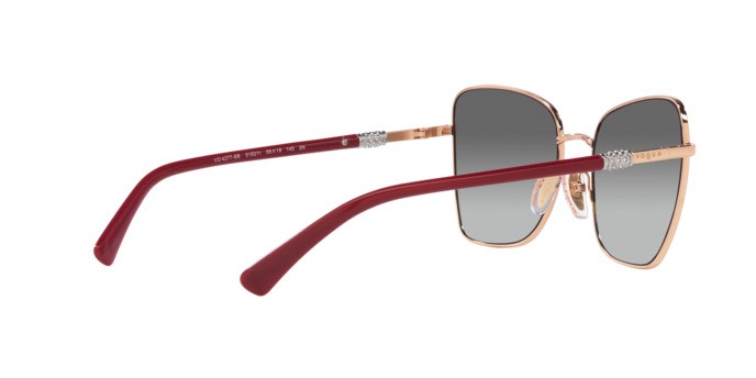 Occhiali da sole Vogue VO 4277SB (515211) colore oro rosa forma farfalla lenti grigio sfumato