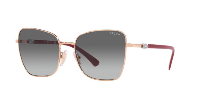Occhiali da sole Vogue VO 4277SB (515211) colore oro rosa forma farfalla lenti grigio sfumato