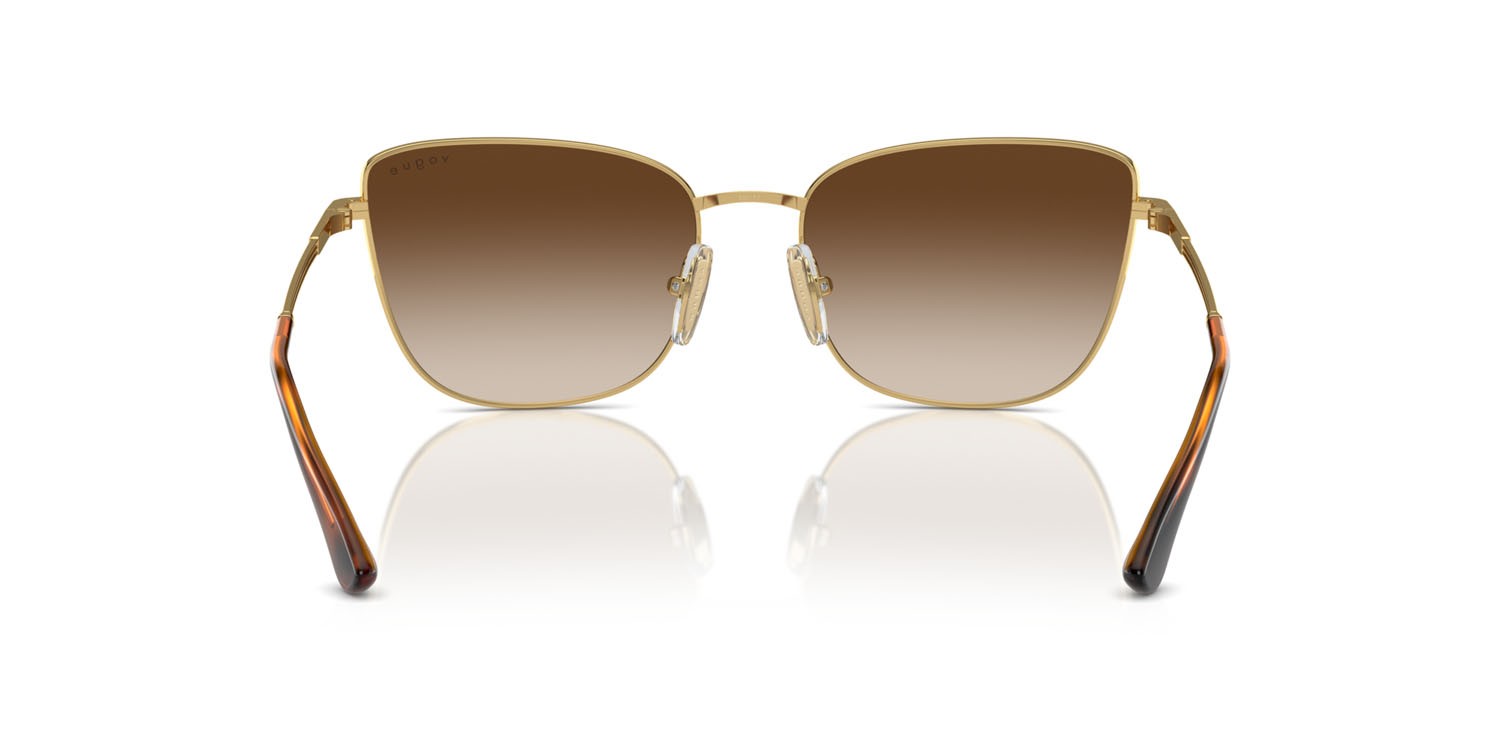 Occhiali da sole Vogue VO 4308S (280/13) colore oro forma farfalla lenti marrone sfumato