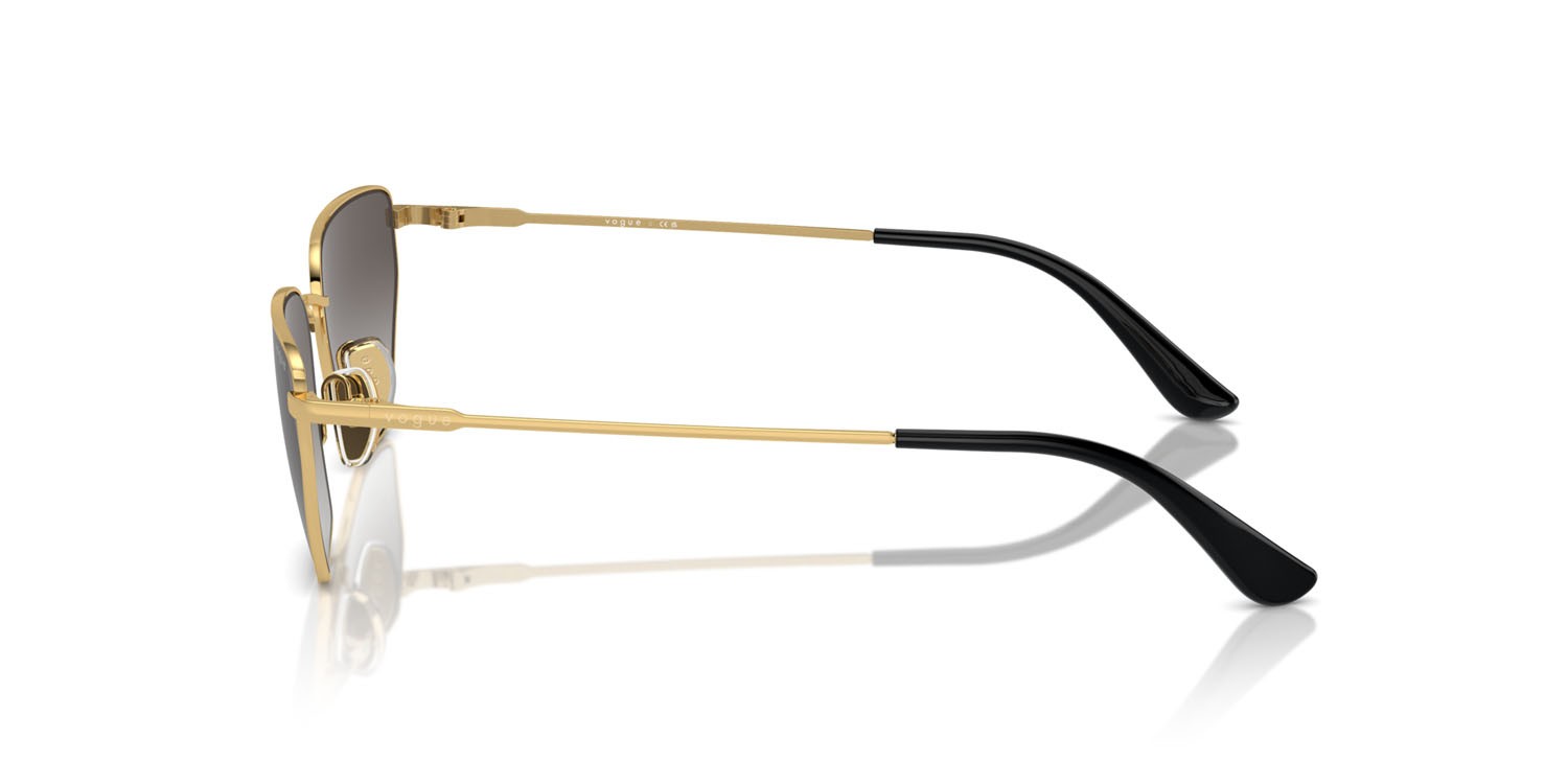 Occhiali da sole Vogue VO 4316S (280/8G) colore oro forma irregolare lenti grigio sfumato nero