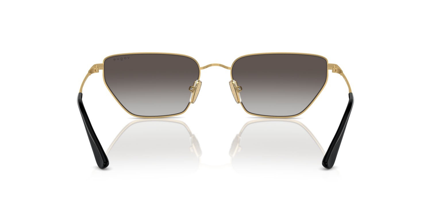 Occhiali da sole Vogue VO 4316S (280/8G) colore oro forma irregolare lenti grigio sfumato nero