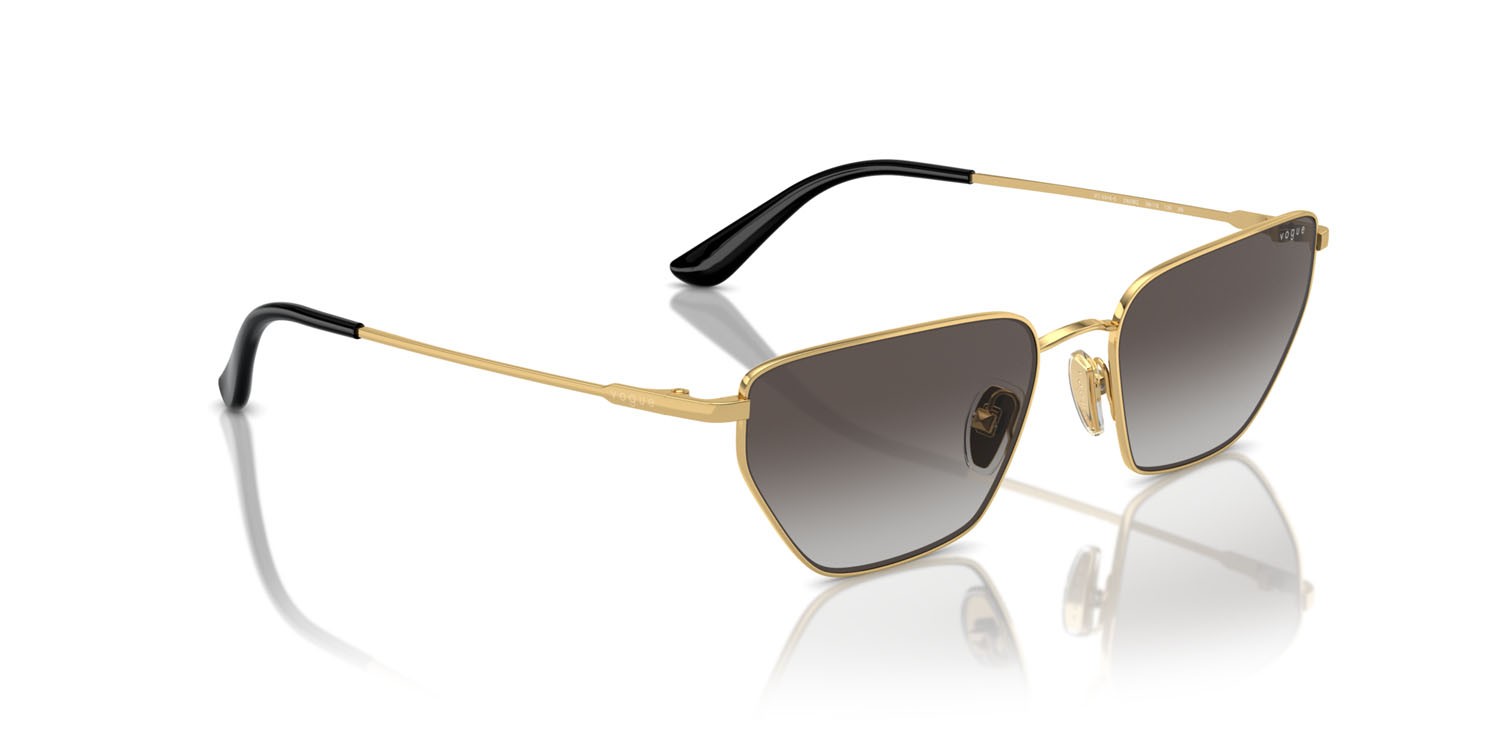 Occhiali da sole Vogue VO 4316S (280/8G) colore oro forma irregolare lenti grigio sfumato nero