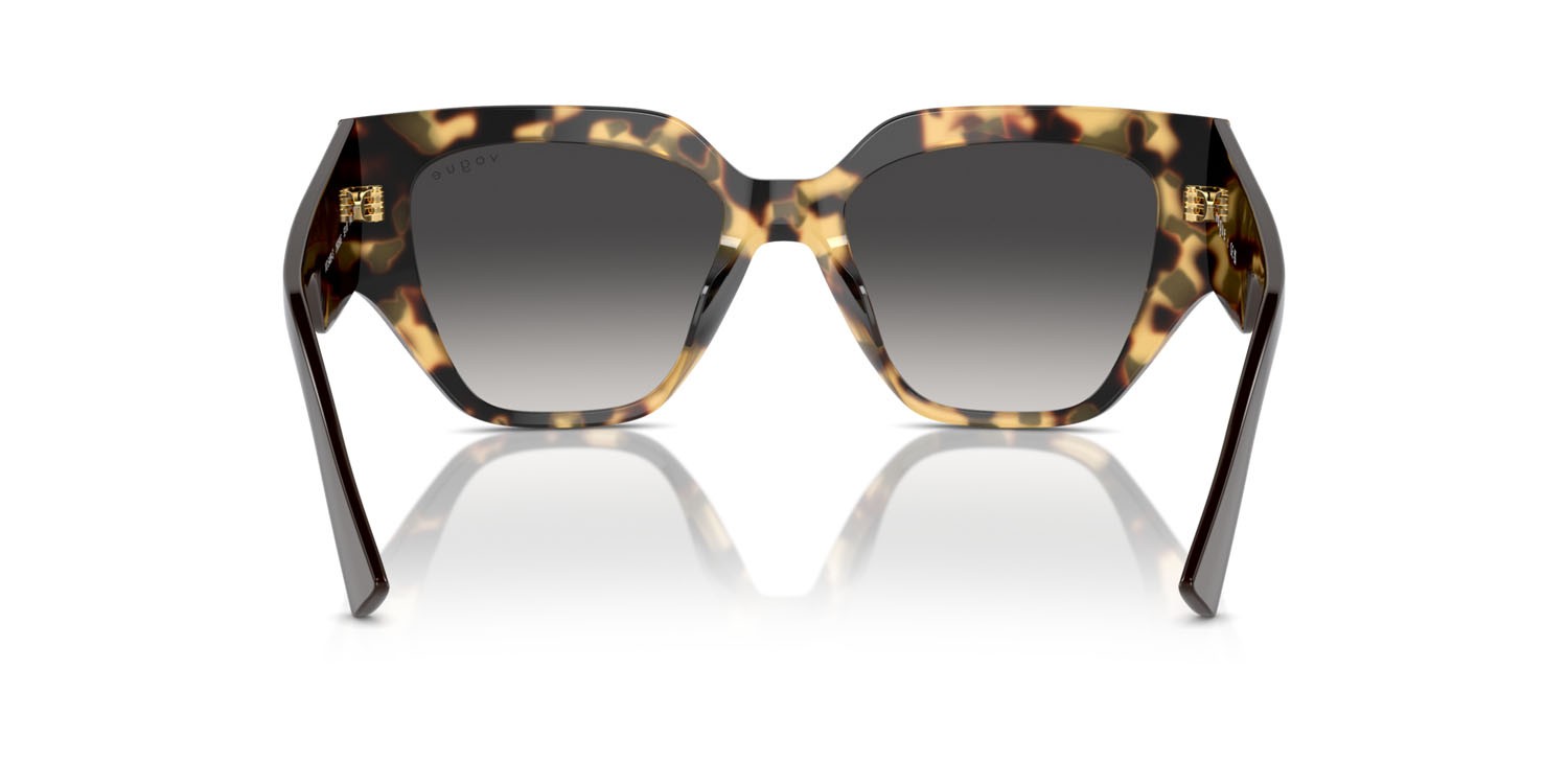 Sunglasses Vogue VO 5409S (26058G) color tartarugato giallo shape irregular lenses grigio sfumato nero