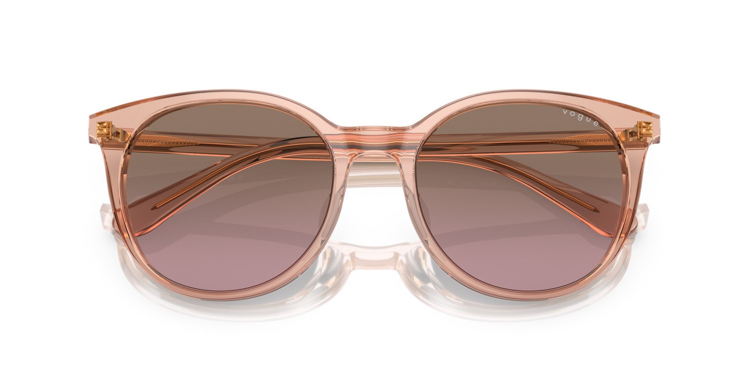 Sunglasses Vogue VO 5468SD (295414) color pesca trasparente shape round lenses violetto sfumato marrone