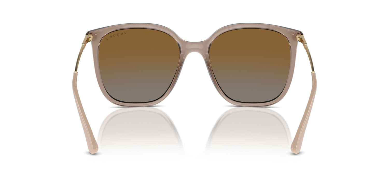 Occhiali da sole Vogue VO 5564S (2940T5) colore marrone trasparente forma quadrato lenti grigio sfumato marrone polarizzata