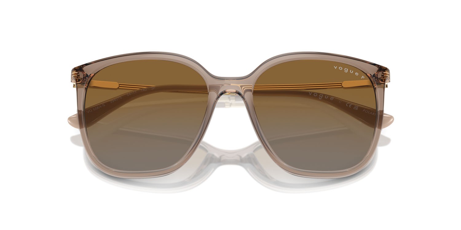 Occhiali da sole Vogue VO 5564S (2940T5) colore marrone trasparente forma quadrato lenti grigio sfumato marrone polarizzata