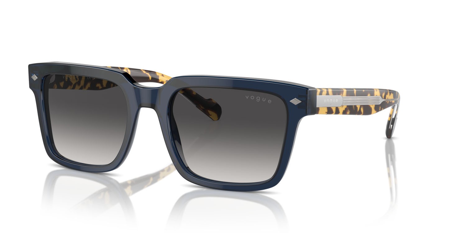Occhiali da sole Vogue VO 5573S (31438G) colore blu trasparente forma quadrato lenti grigio sfumato nero