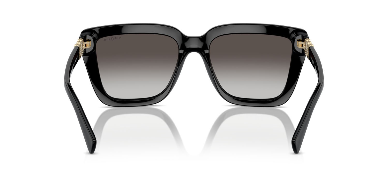 Occhiali da sole Vogue VO 5575SB (W44/8G) colore nero forma farfalla lenti grigio sfumato nero