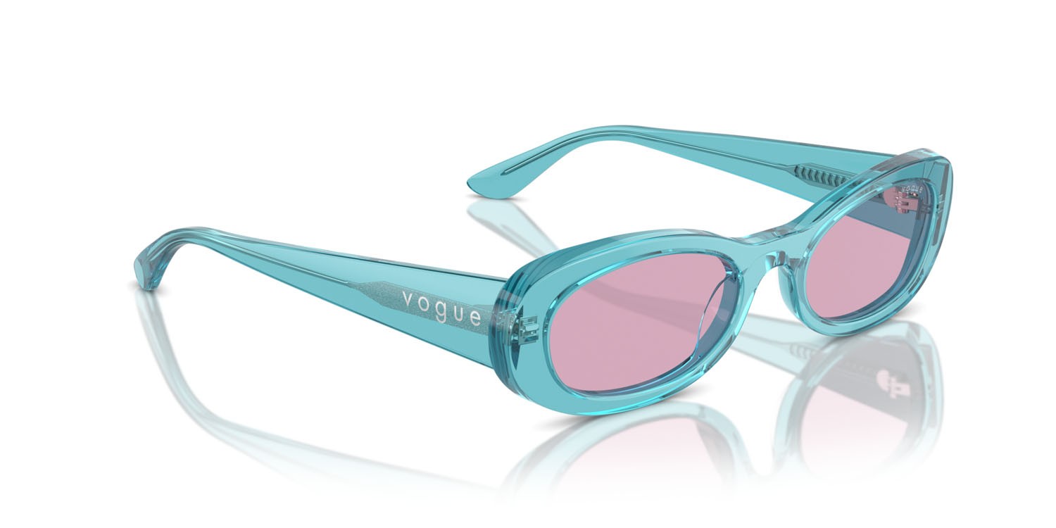 Occhiali da sole Vogue VO 5582S (316676) colore turchese trasparente forma ovale lenti viola